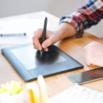 black-pen-tablet-with-stylus-used-by-male-designer-2021-08-26-18-19-36-utc.jpg